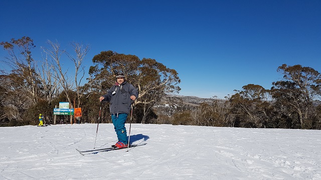 PRISTINE SNOW FIELDS AT MT SELWYN SKI RESORT a group of guests from Boutique Motel Sefton House with owner Tane, enjoy the snow during an escorted group tour